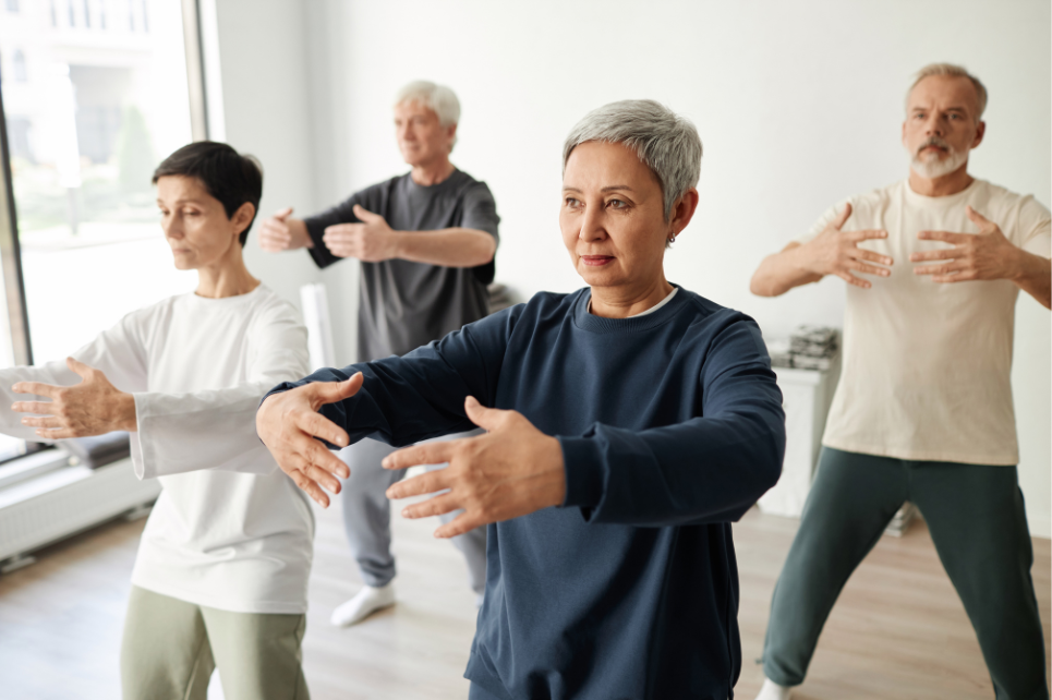 Adults taking part in a group movement and balance exercise session